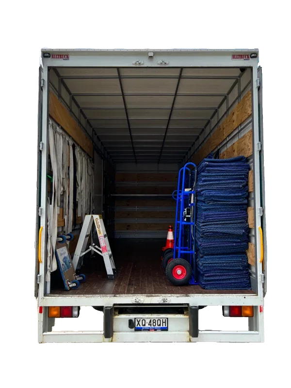Moving truck containing removal pads, trolleys and a ladder
