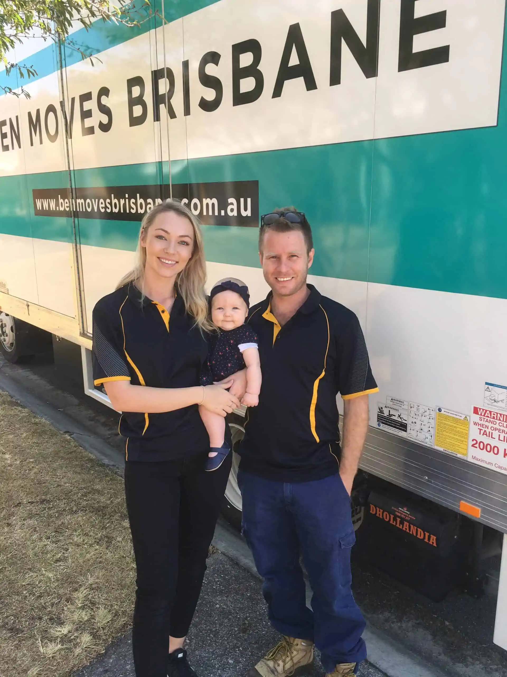 Ben Moves Brisbane family standing in front of a moving truck